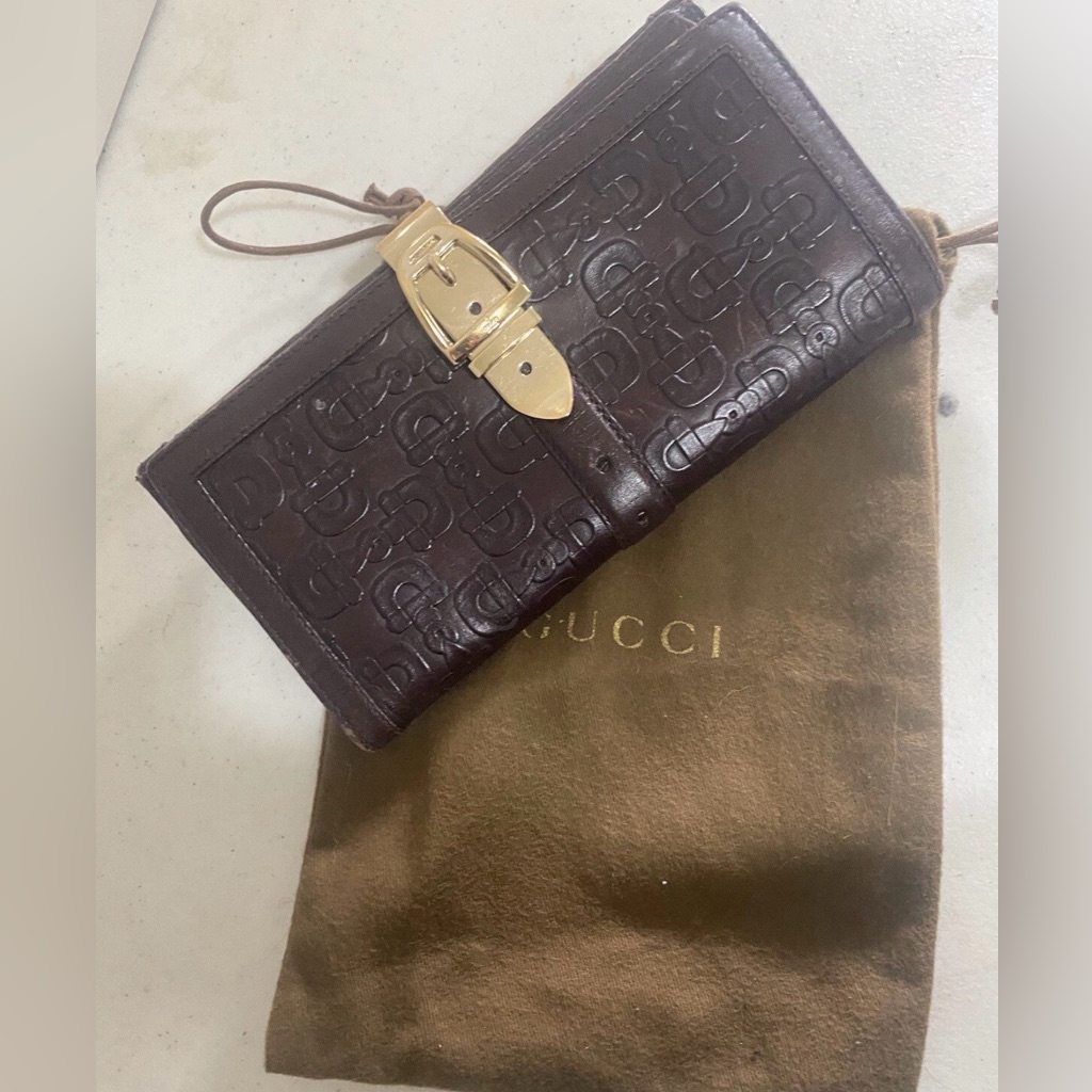 Authentic Gucci Dark Brown Embossed Leather Wallet With Gold Buckle